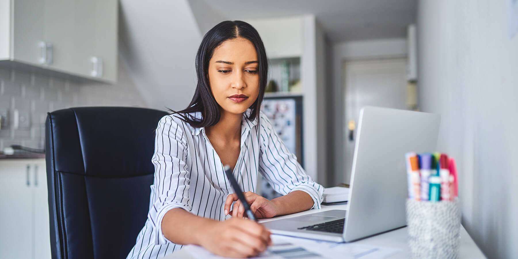 Professional female CPA working from home office