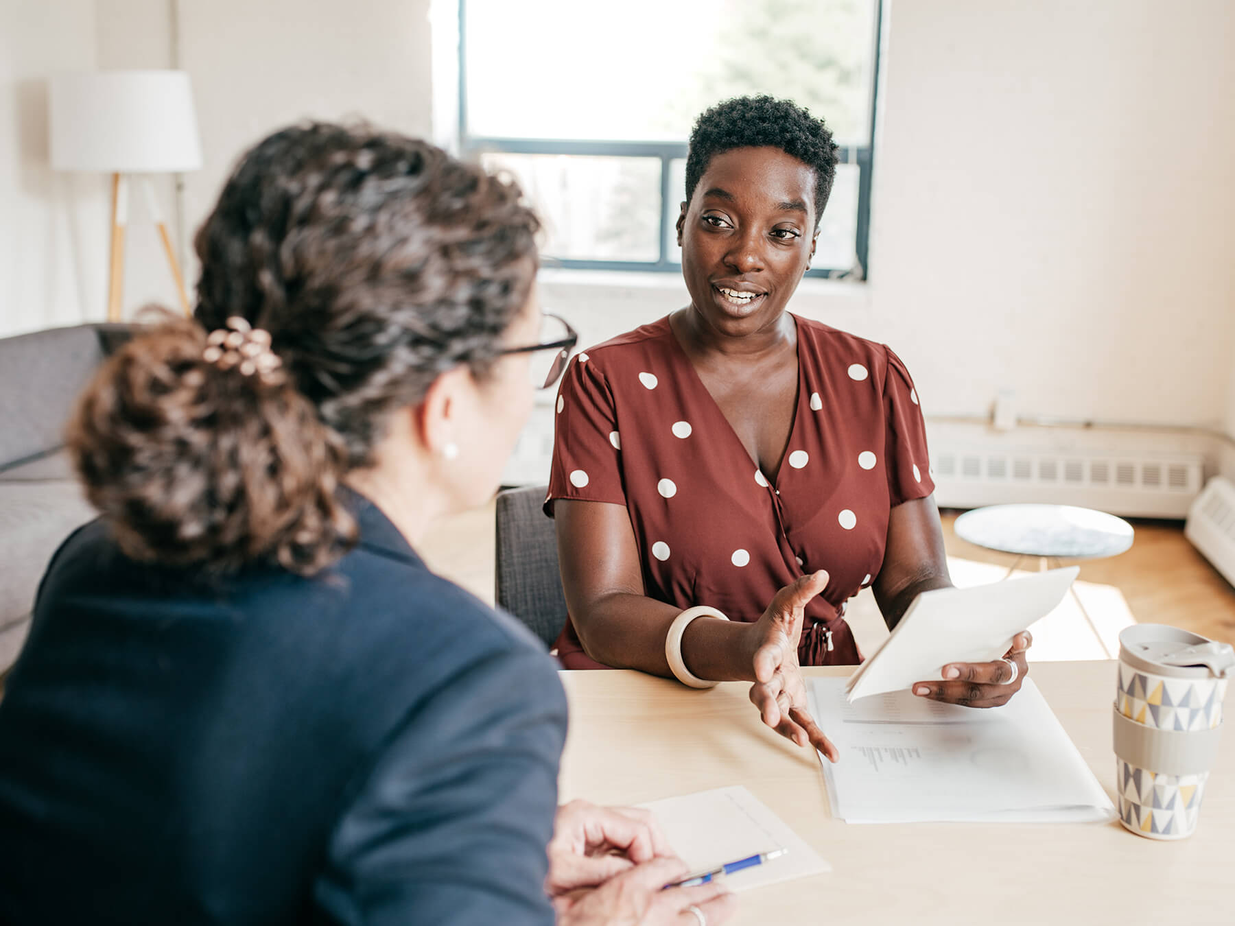 Professional female CPA meeting with her client