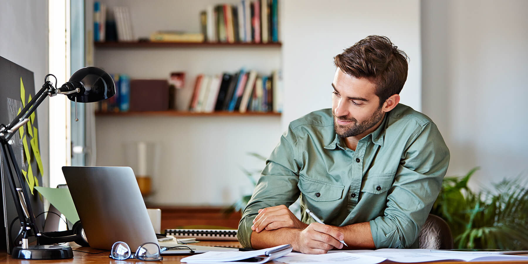 Young male professional CPA working on laptop