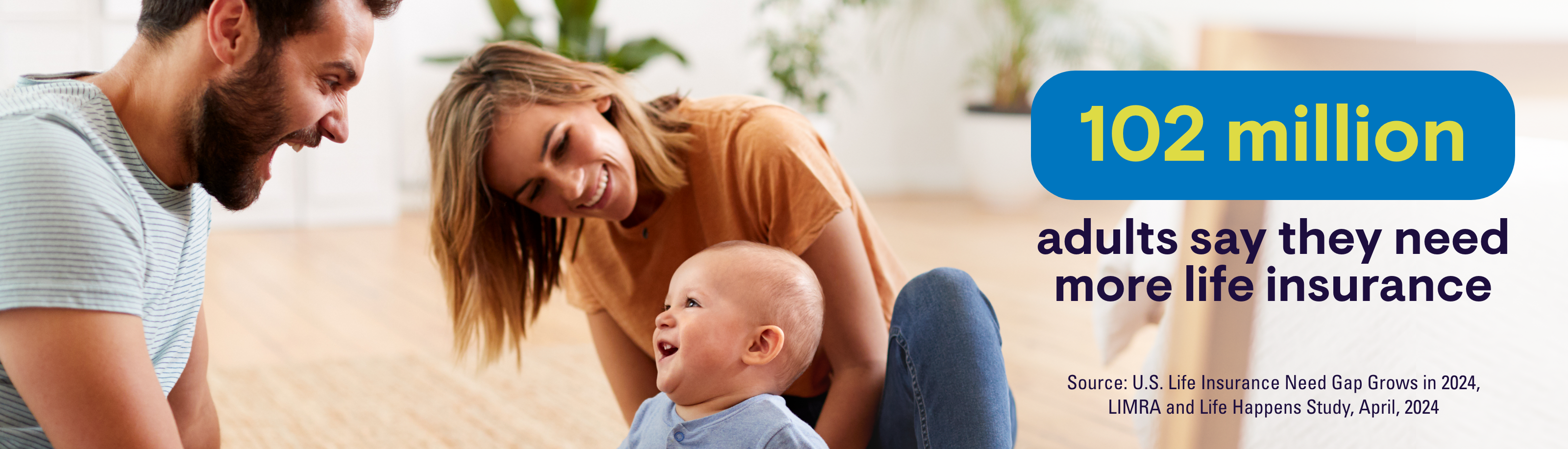 A person sitting on the floor with a baby